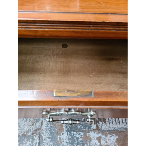 1122 - An Edwardian walnut chest of two short over two long drawers - approx. 84cm high x 121cm wide x 49cm... 