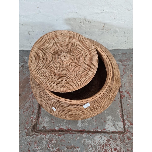 1127 - A wicker lidded basket - approx. 47cm high