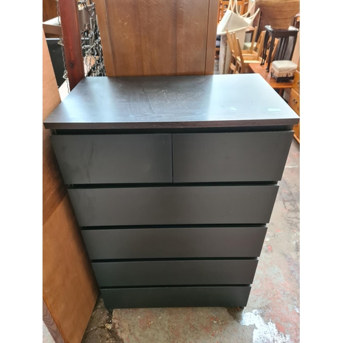 1131 - An Ikea black chest of two short over four long drawers - approx. 124cm high x 80cm wide x 48cm deep