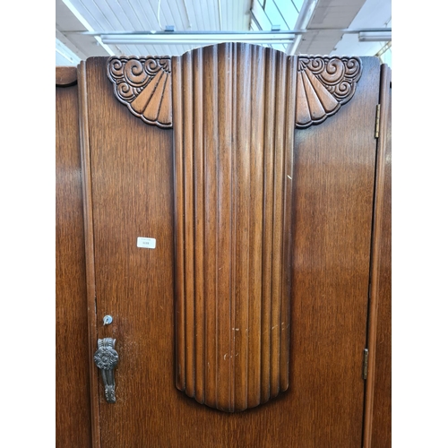 1133 - An Art Deco style oak single door wardrobe - approx. 187cm high x 122cm wide x 50cm deep