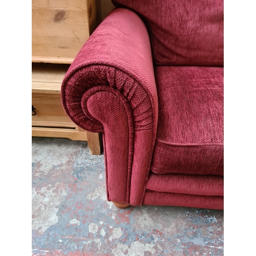 1164 - A modern red upholstered armchair