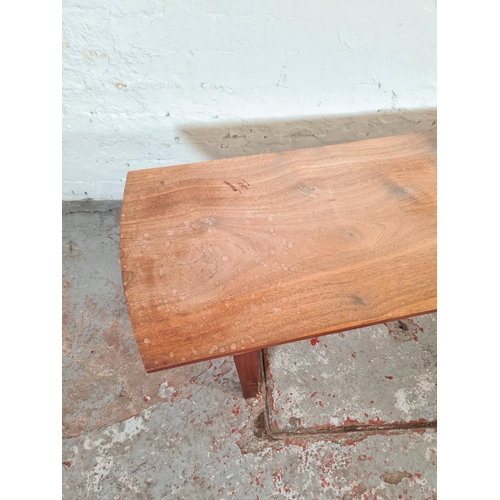 1174 - A mid 20th century teak rectangular coffee table - approx. 44cm high x 46cm wide x 139cm long