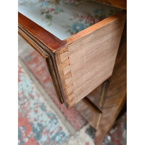 1177 - An Edwardian mahogany chest of three drawers with carved splashback - approx. 94cm high x 106cm wide... 