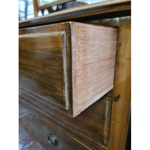 1178 - An Edwardian mahogany dressing chest with upper bevelled edge mirror, two short drawers and two long... 