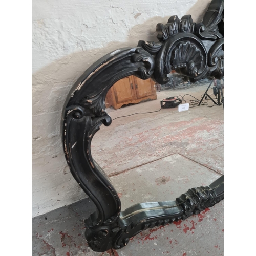 1200 - A 19th century style black painted framed wall mirror - approx. 98cm x 85cm