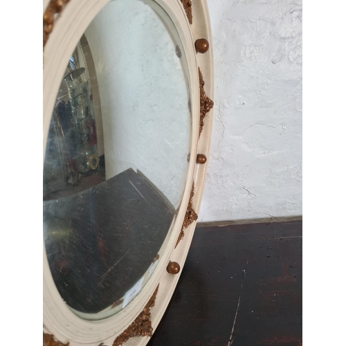 1230 - A Regency style white and gilt framed convex mirror - approx. 45cm diameter