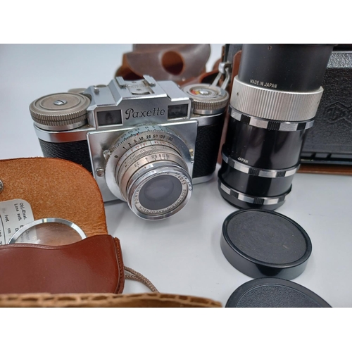 1264 - A collection of camera equipment to include cased Praktica VF 35mm SLR, cased Agilux Agifold folding... 