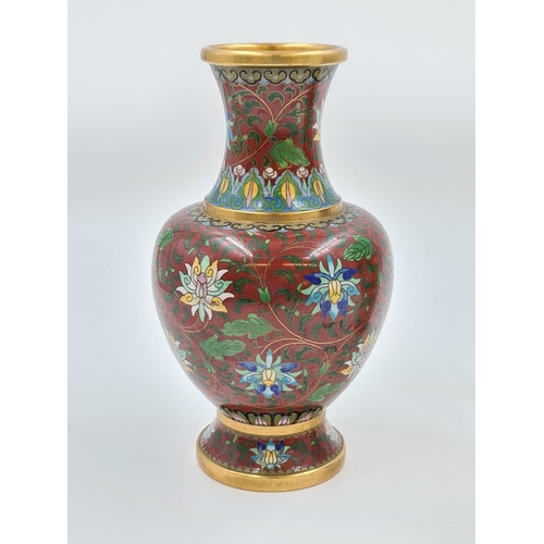 421 - Two items, one late 20th century cloisonné vase and one Middle Eastern white metal 20cm beaker