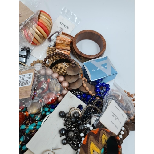 562 - A collection of assorted costume jewellery - approx. gross weight with box 2.9kg