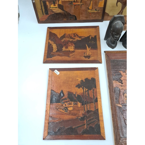 630 - A collection of treenware to include a pair of African carved hardwood bookends approx. 13cm high, f... 