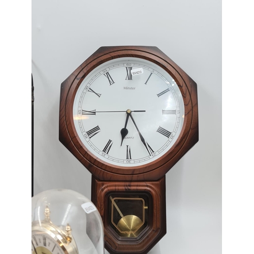 639 - Six assorted clocks and barometers to include novelty ships wheel barometer, Kundo anniversary clock... 