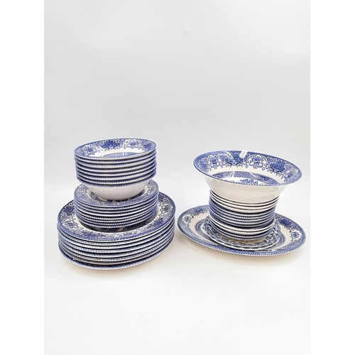 470 - A large collection of assorted blue and white china to include Willow pattern teapot, coffee pot and... 