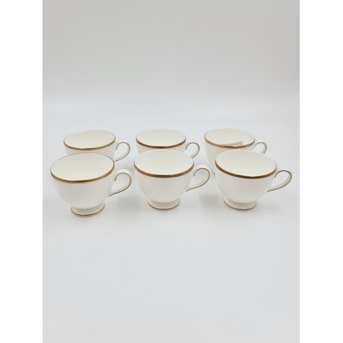 475 - Six Wedgwood gold and white patterned bone china trios