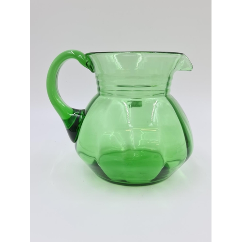 489 - A collection of vintage green glassware to include seven piece uranium glass drinking set comprising... 