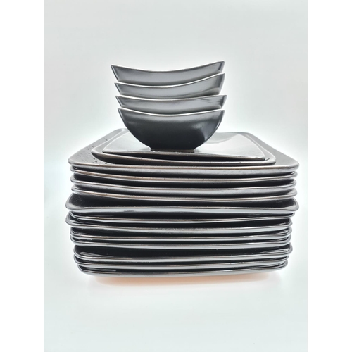 493 - A collection of black dinnerware to include five Next Diffusion plates (four dinner and one side), f... 