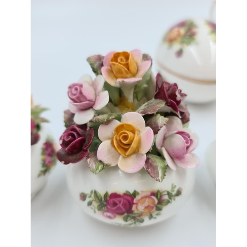 498 - Fourteen pieces of Royal Albert Old Country Roses bone china to include two tea cups, egg shaped tri... 