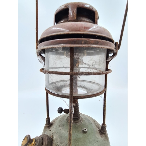 502 - A vintage Tilley storm lantern - approx. 34cm high