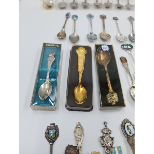 503 - A large collection of assorted vintage collector's tea spoons to include Italy, Denmark, Ireland, Ed... 