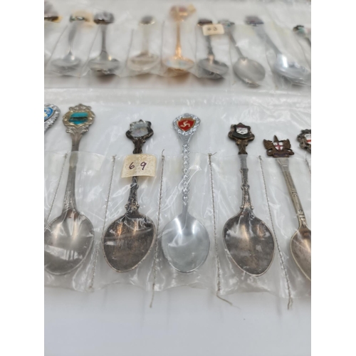 503 - A large collection of assorted vintage collector's tea spoons to include Italy, Denmark, Ireland, Ed... 