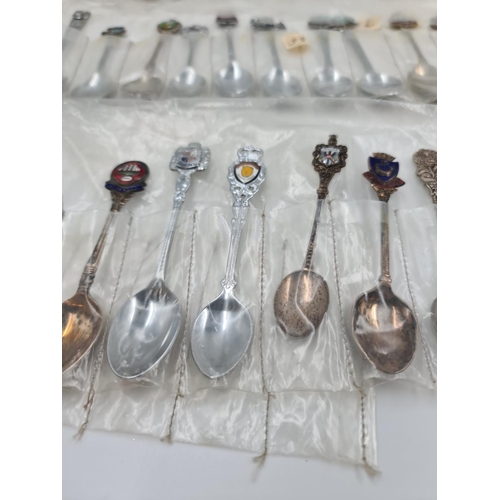 503 - A large collection of assorted vintage collector's tea spoons to include Italy, Denmark, Ireland, Ed... 