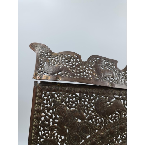 504 - An Indian pierced brass screen - approx. 59cm high x 46cm wide