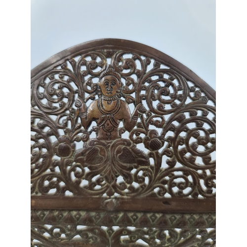 504 - An Indian pierced brass screen - approx. 59cm high x 46cm wide