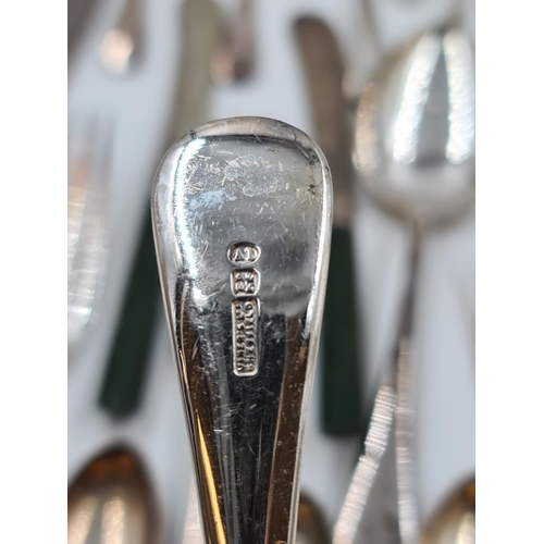 505 - A large collection of assorted vintage cutlery to include hallmarked Sheffield sterling silver tea s... 