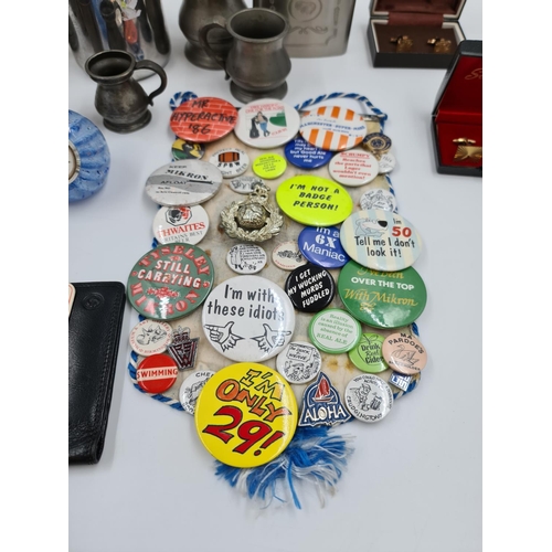 508 - A collection of assorted items to include coins, pewter tankards, vintage smoking pipes, badges, Cai... 