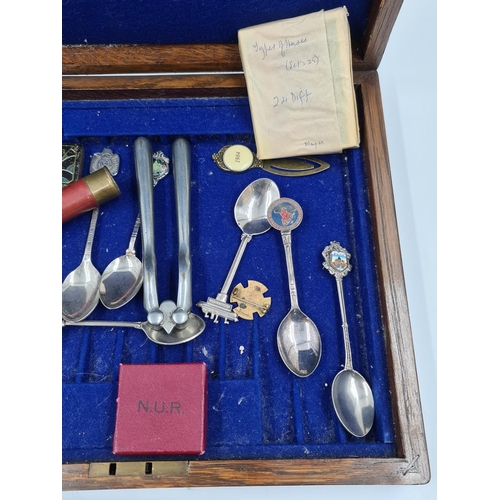 509 - An early 20th century oak cutlery box containing assorted items to include Victorian white metal but... 