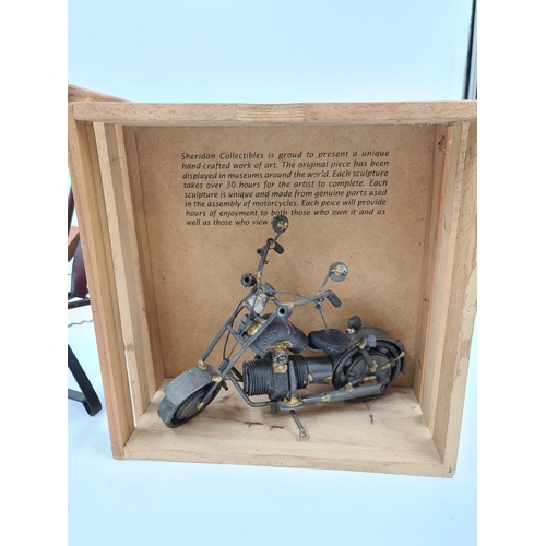 516 - Two contemporary bike sculptures, one being Sheridan Collectables with wooden crate - approx. 29cm s... 