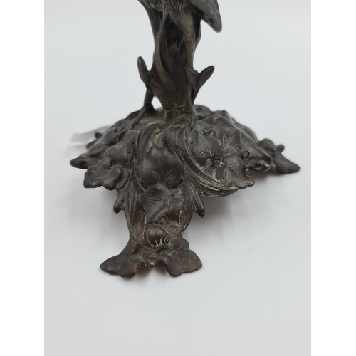 521 - An Art Nouveau E.G. Zimmermann cast metal candle holder with stork design - approx. 25cm high