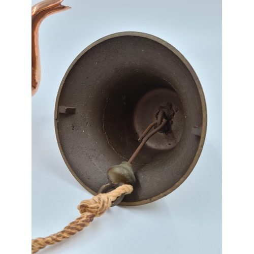 528 - Two items, one Victorian copper kettle with acorn finial and one brass wall mountable bell