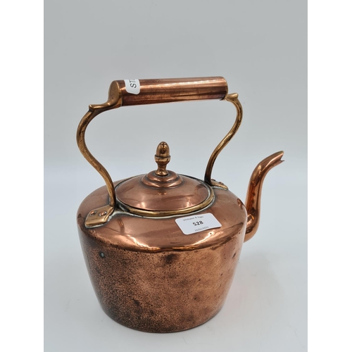 528 - Two items, one Victorian copper kettle with acorn finial and one brass wall mountable bell