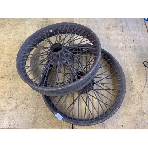 1551 - A pair of early/mid 20th century wire spoke car wheels, possibly model T Ford