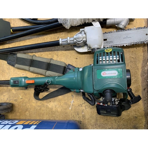 1553 - A Q Garden QGMC petrol powered gardener's multi-tool with brush cutter, grass strimmer, chainsaw and... 