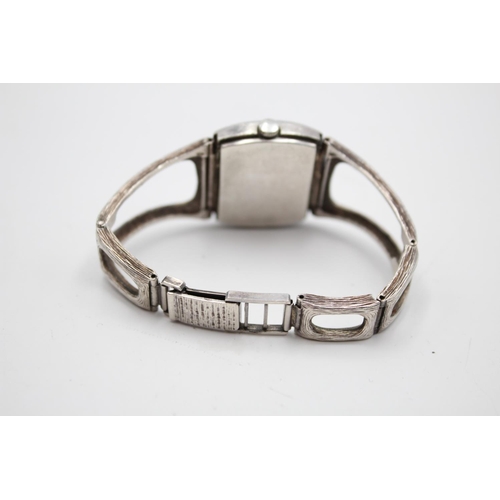 256 - A vintage c.1970's ladies Rotary .925 silver hand wind wristwatch with open link bark effect bracele... 