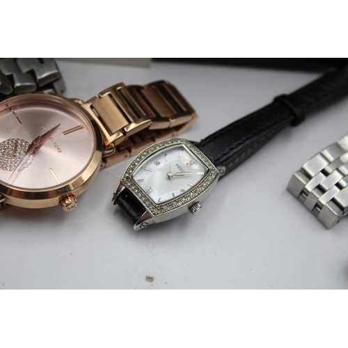 259 - Nine ladies fashion/designer quartz wristwatches to include Michael Kors, Fossil etc.