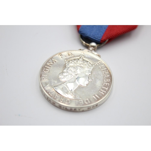 271 - Two vintage boxed medals, one Elizabeth II Imperial Service medal presented to William Gilbey M.B.E ... 