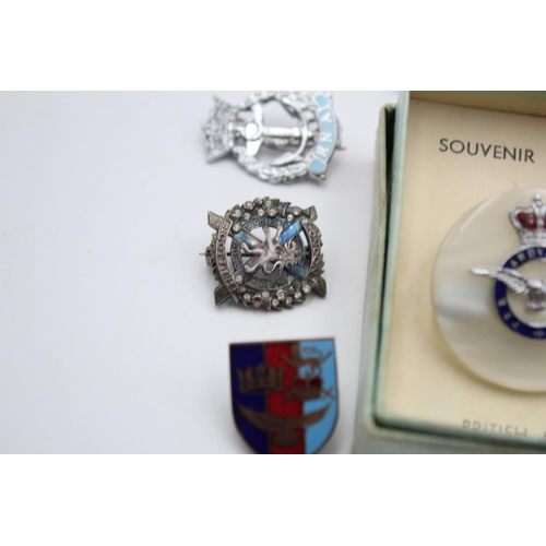 280 - Fifteen assorted vintage military lapel and sweetheart badges to include Royal Navy, RAF etc.