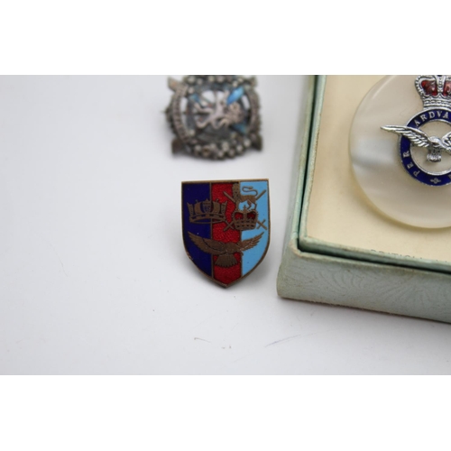 280 - Fifteen assorted vintage military lapel and sweetheart badges to include Royal Navy, RAF etc.