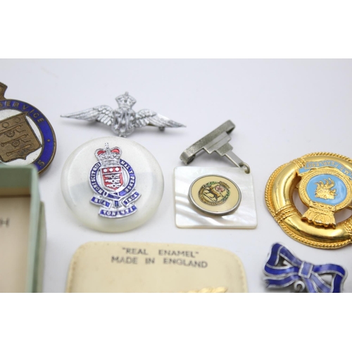 280 - Fifteen assorted vintage military lapel and sweetheart badges to include Royal Navy, RAF etc.