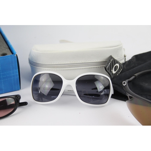 309 - Four pairs of Oakley sunglasses