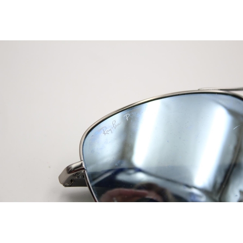 312 - A pair of Ray-Ban thick chrome metal framed sunglasses with polarized lenses and case