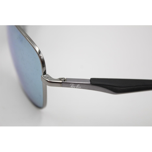 312 - A pair of Ray-Ban thick chrome metal framed sunglasses with polarized lenses and case