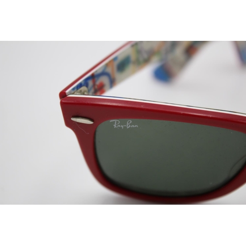 313 - A pair of Ray-Ban red framed Wayfarer sunglasses