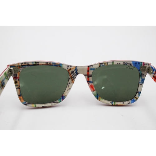 313 - A pair of Ray-Ban red framed Wayfarer sunglasses