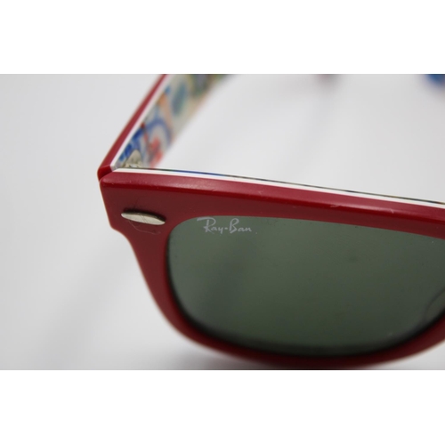 313 - A pair of Ray-Ban red framed Wayfarer sunglasses