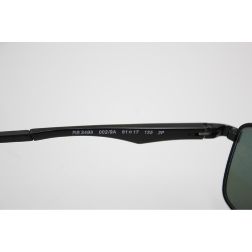 315 - A pair of Ray-Ban black framed rectangular sunglasses with polarized lenses and case