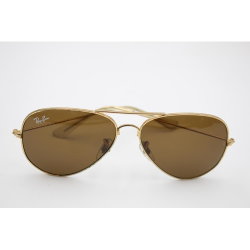 320 - A pair of Ray-Ban gold tone aviator sunglasses