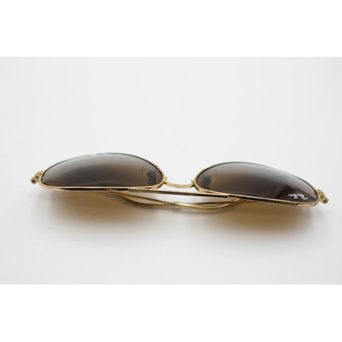 320 - A pair of Ray-Ban gold tone aviator sunglasses